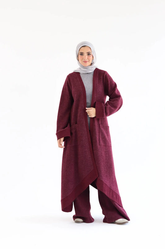 Burgundy knitted cardigan set featuring a long open cardigan, wide-leg pants, and straight relaxed fit, front full-length view.