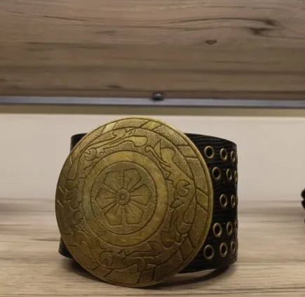 Elegant women’s waist belt with decorative round buckle