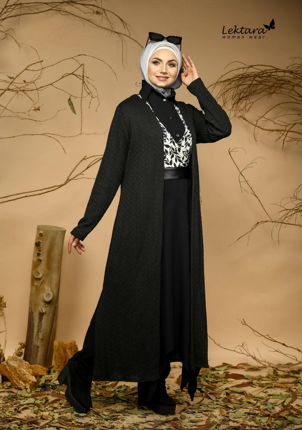 Long modest dress with decorative chest panel and refined winter styling