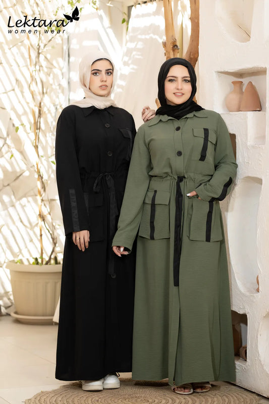 Modest maxi dress in black and olive green with button-front design and waist belt, full-length silhouette, styled for everyday modest wear