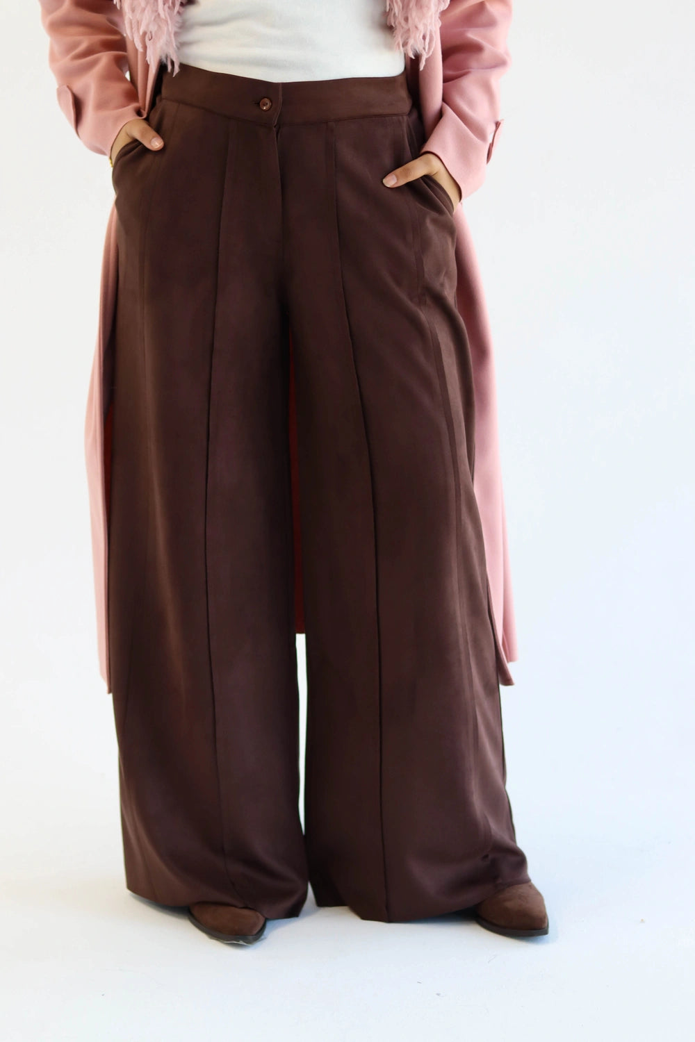 Wide leg suede pants in brown, front view on model