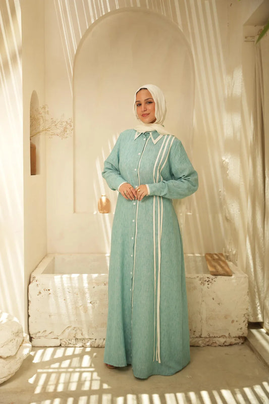 Mint linen maxi dress with ribbon details and long sleeves, front view