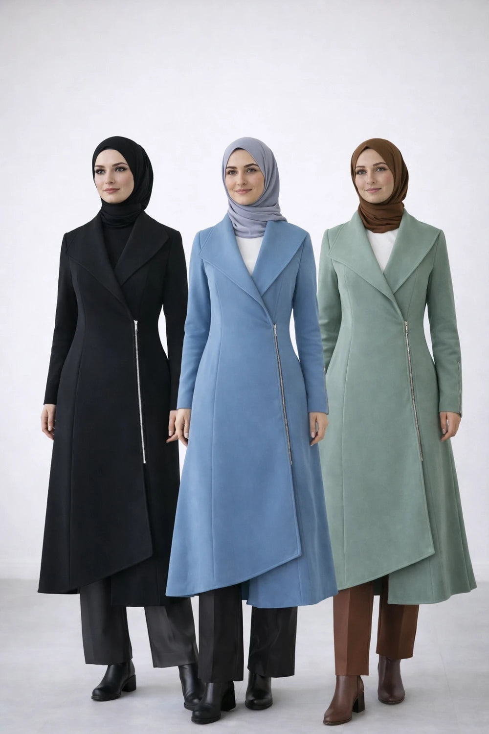 Three women  in a hijab wearing long coats in black, blue, and green on a white background