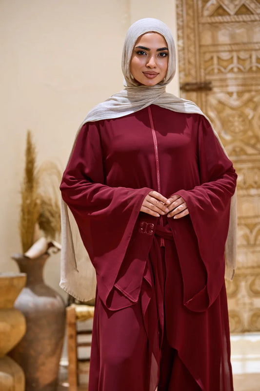 Burgundy layered chiffon tunic with an extended bell sleeve and flowing front panels