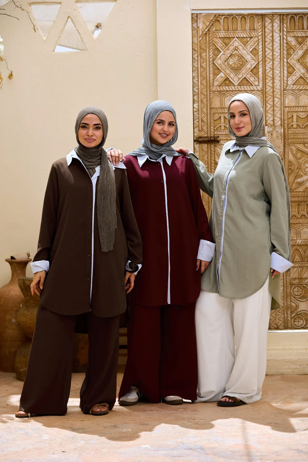 Full-length group view of brown, burgundy and army green Linen Shirts with Striped Details