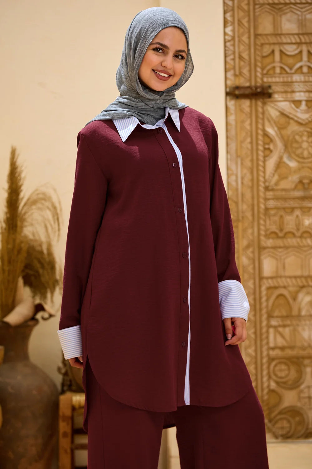 Front view of the burgundy Linen Shirt showing the striped collar, button placket and cuffs