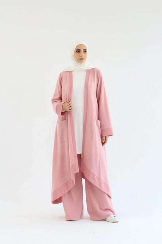 Pink knitted cardigan set with open-front long cardigan, wide-leg pants, and soft draped silhouette, front full-length view.