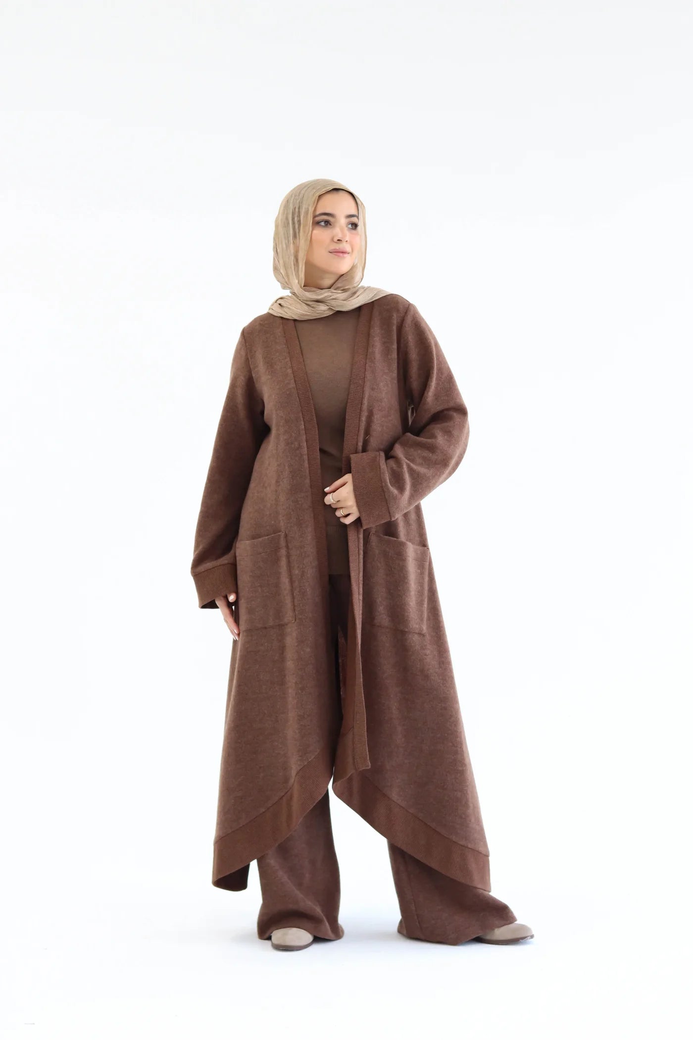Brown knitted cardigan set with long open cardigan and wide pants, front full-length view.