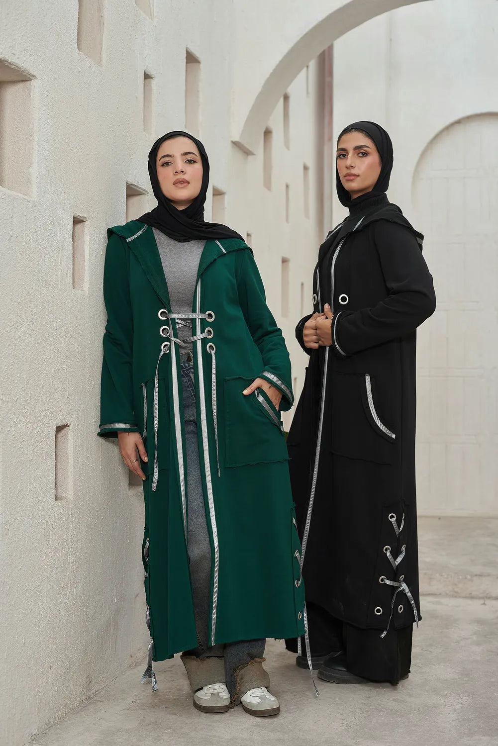 Two Women’s modest stylish corsage cardigan black and olive – summer melton with waterproof leather strap – front view on model and side view on model.