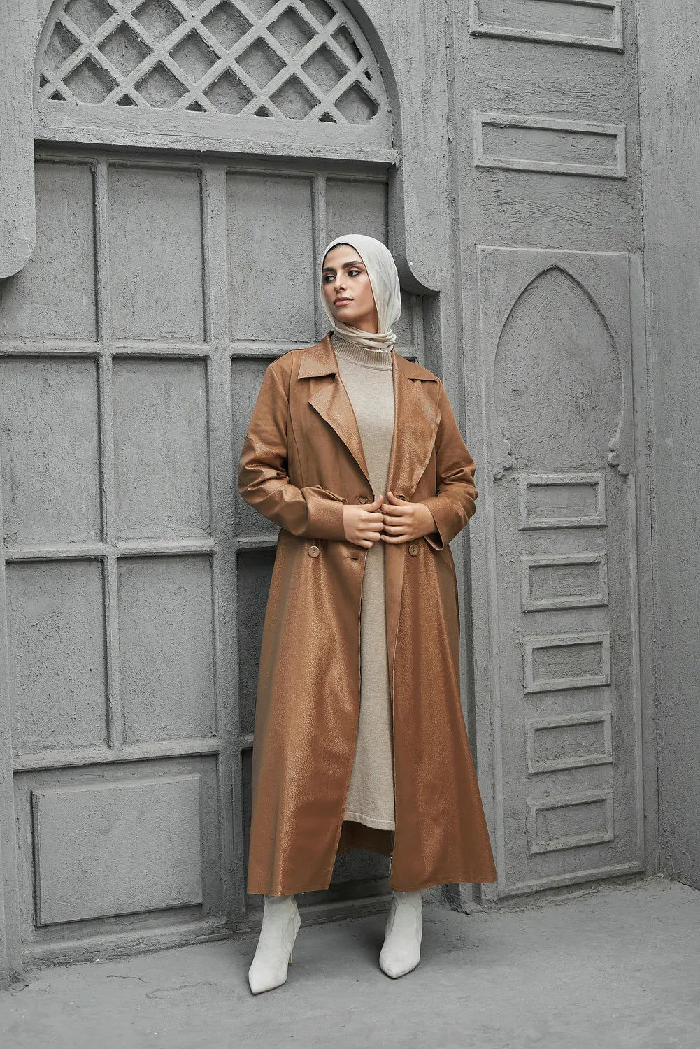 Women’s modest stylish caramel-beige trench coat – snake print leather and suede – full length front view on model.”