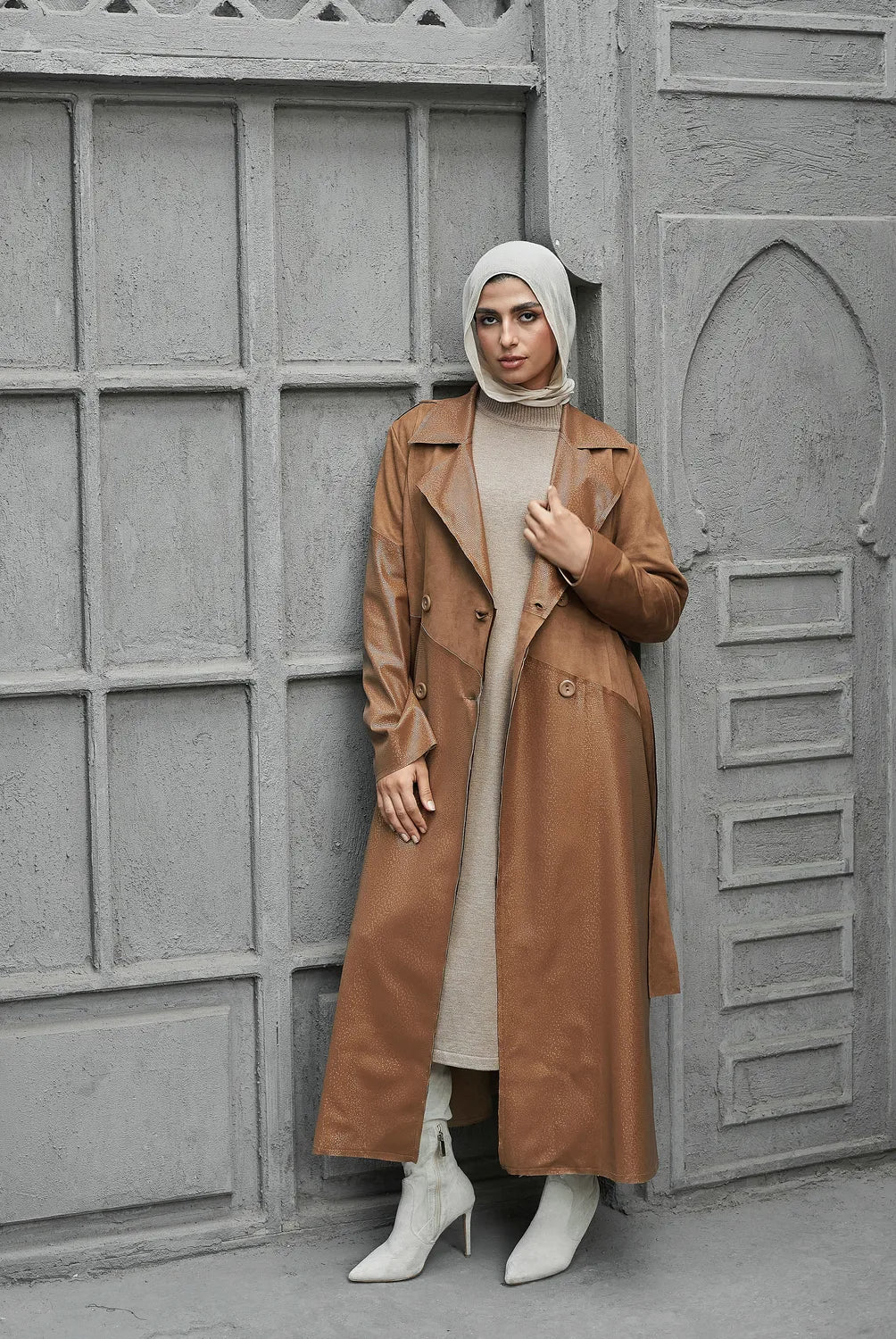 Women’s modest stylish caramel-beige trench coat – snake print leather and suede – full length front view on model.”