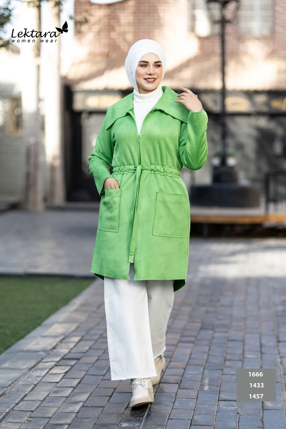 Suede short jacket in green – front view on model