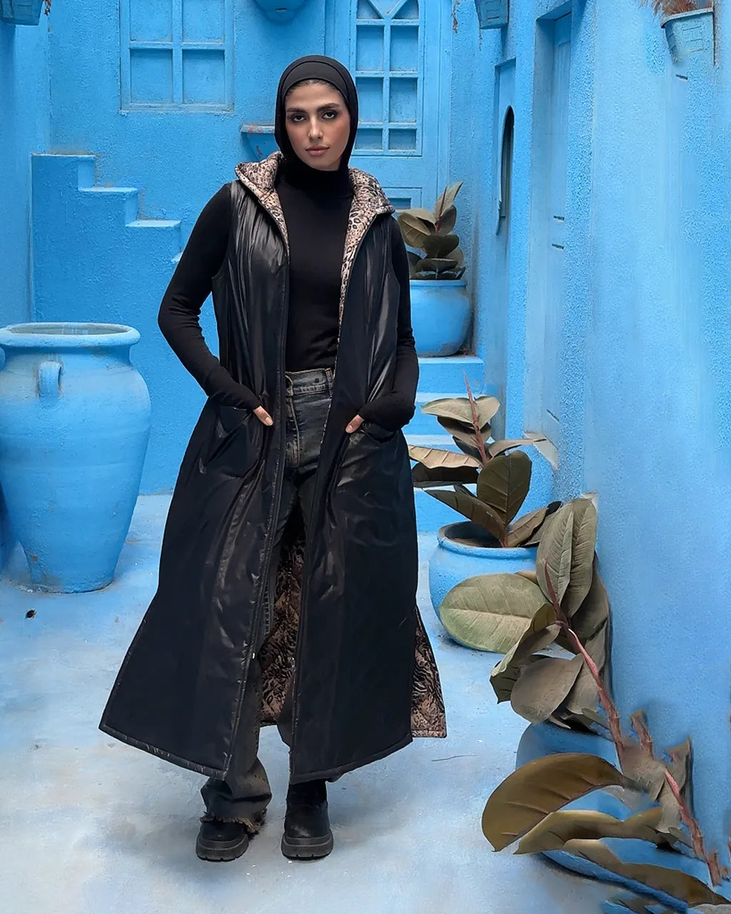 Women's Black waterproof puffer vest – double-face fabric – front view with hood